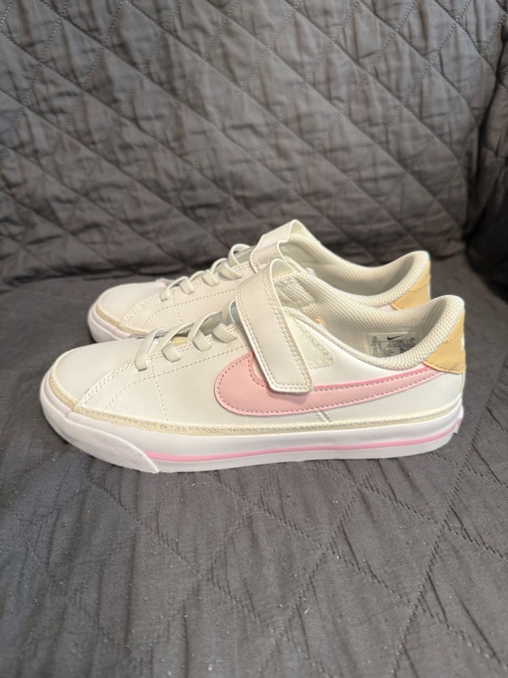 Nike Kids Cream Sneakers with Pink Swoosh and Yellow Heel
Size 3Y